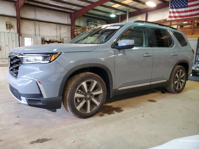 Image 1 of 2024 HONDA PILOT TOURING 2024 with VIN 5FNYG2H70RB007606