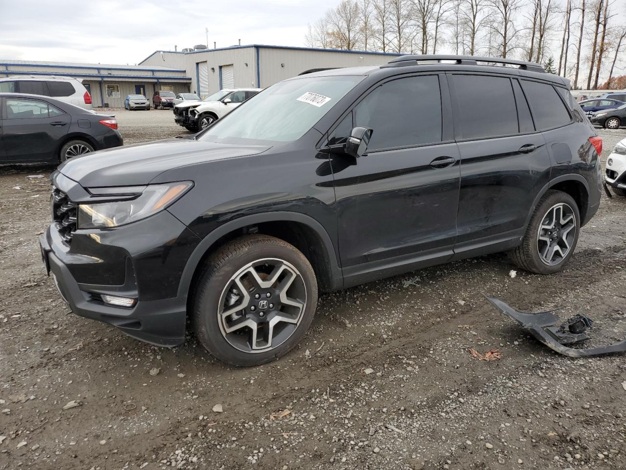 Image 1 of 2023 HONDA PASSPORT ELITE 2023 with VIN 5FNYF8H08PB018584