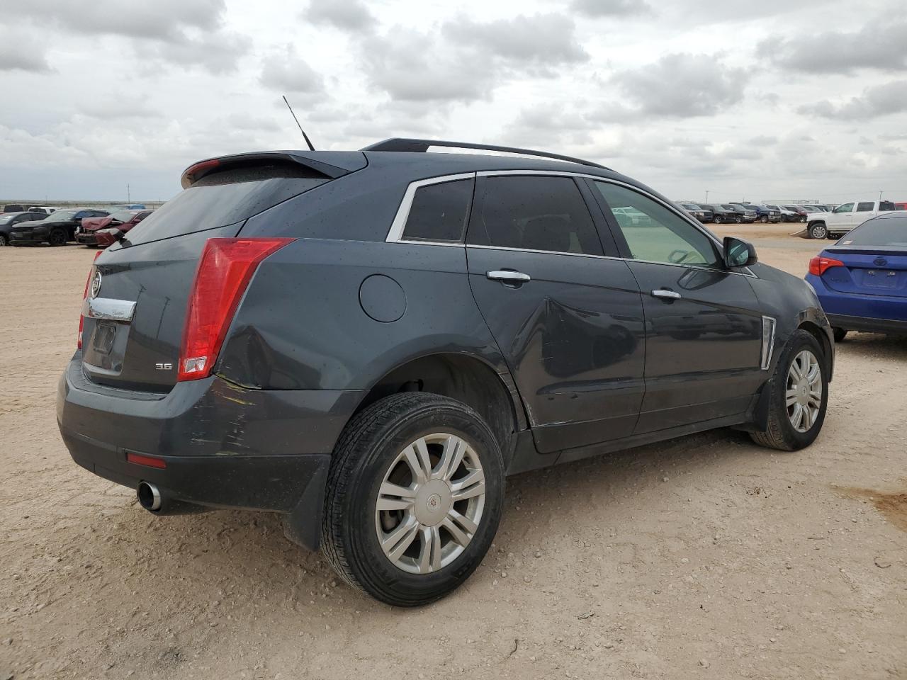 Изображение 3 Cadillac Srx 2013 с VIN 3GYFNAE35DS549982