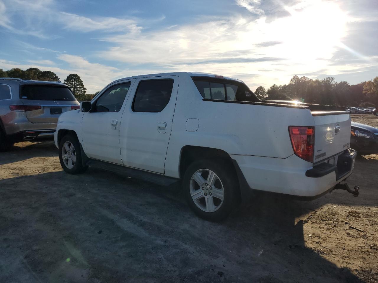 Obraz 2 z 2011 HONDA RIDGELINE RTL 2011 z VIN 5FPYK1F56BB010291