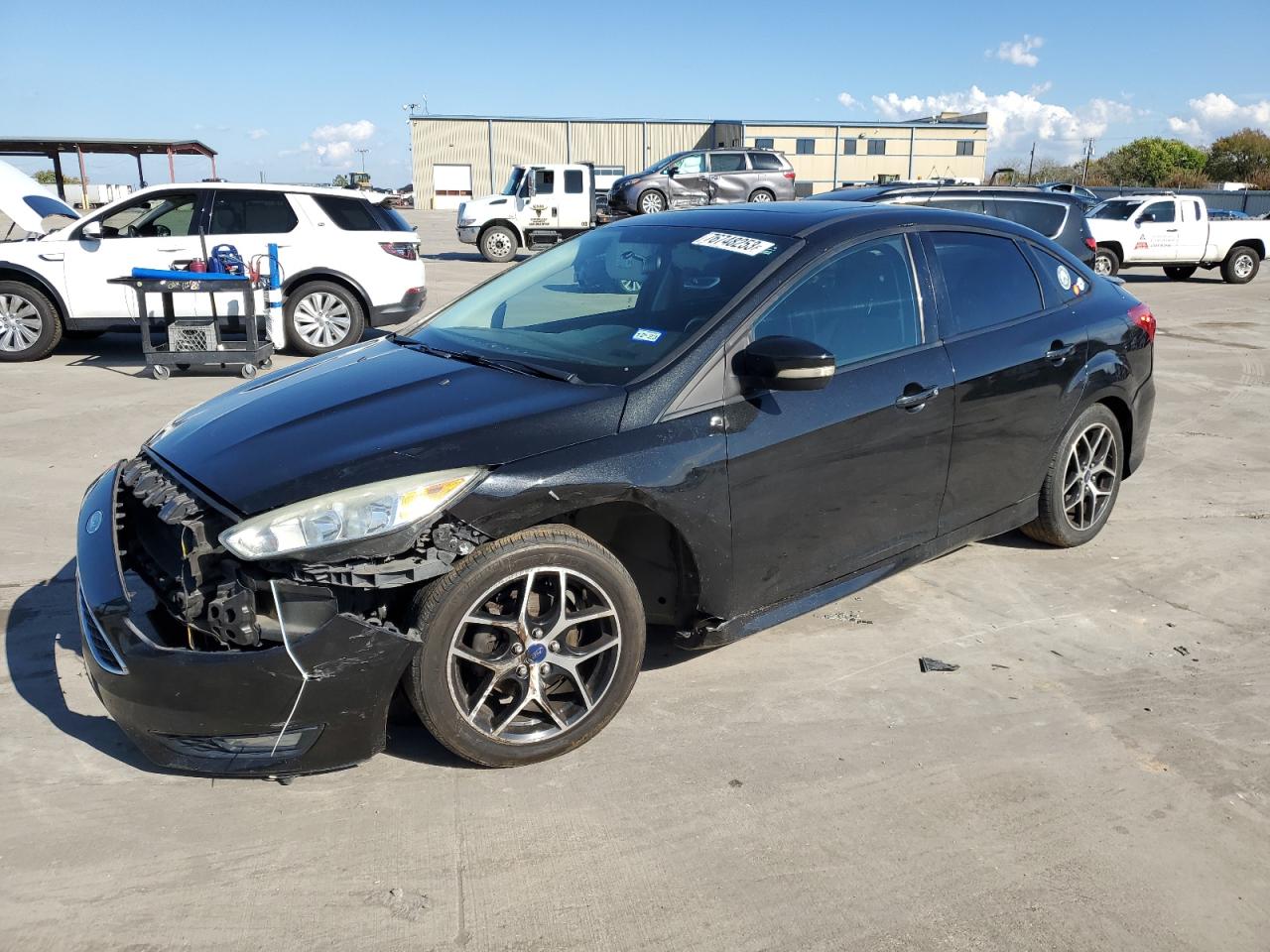 Image 1 of 2015 FORD FOCUS SE 2015 with VIN 1FADP3F22FL215402