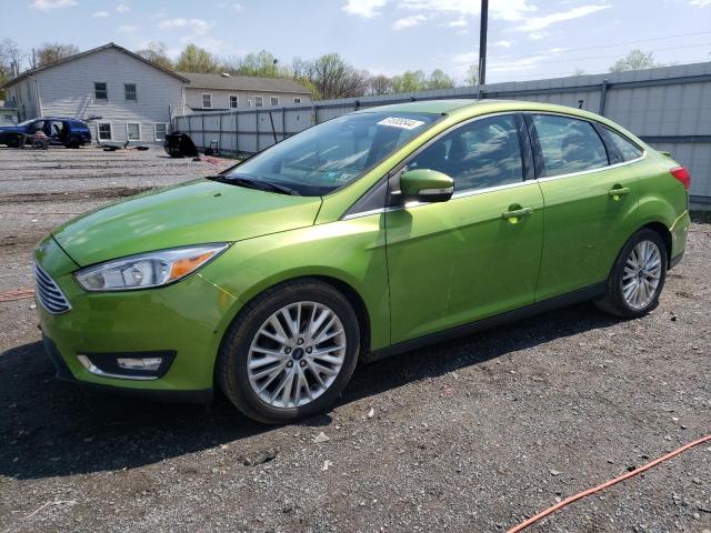 Image 1 of 2018 FORD FOCUS TITANIUM 2018 with VIN 1FADP3J24JL252838