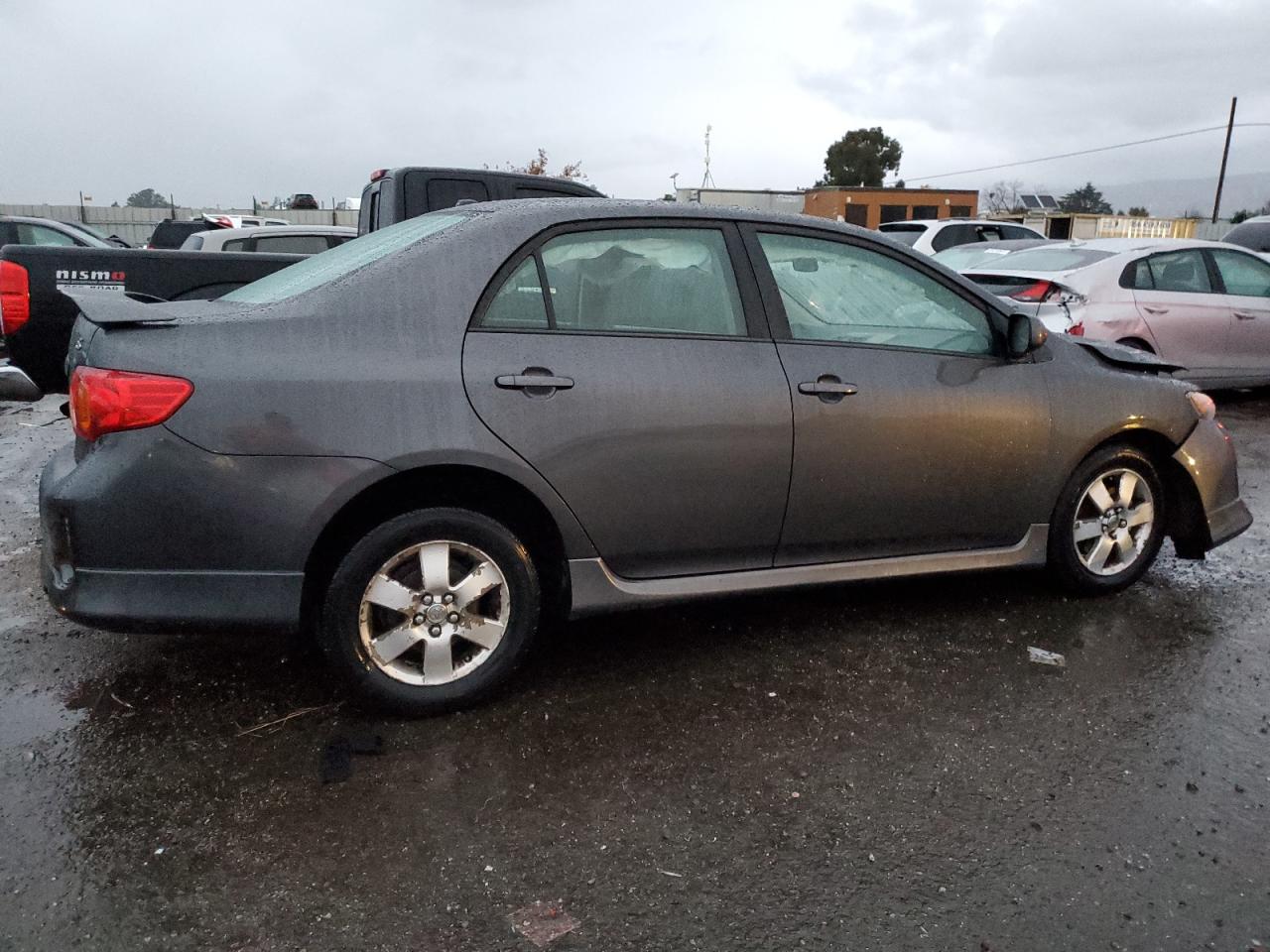 Image 3 of 2009 TOYOTA COROLLA BASE 2009 with VIN 1NXBU40EX9Z048980
