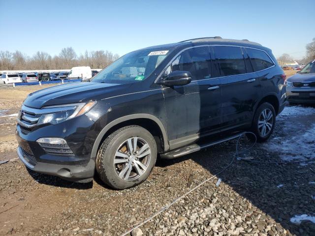 Obraz 1 z 2018 HONDA PILOT TOURING 2018 z VIN 5FNYF6H97JB069620