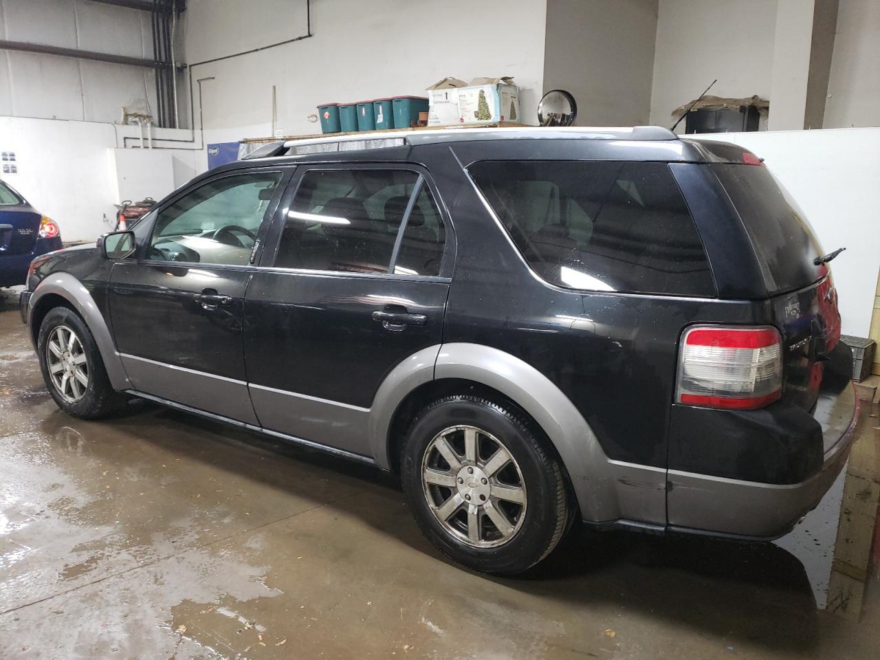 Изображение 2 2009 FORD TAURUS X SEL 2009 с VIN 1FMDK02WX9GA04926