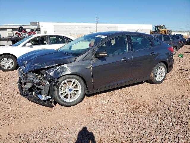 Obraz 1 z 2016 FORD FOCUS SE 2016 z VIN 1FADP3F22GL395966