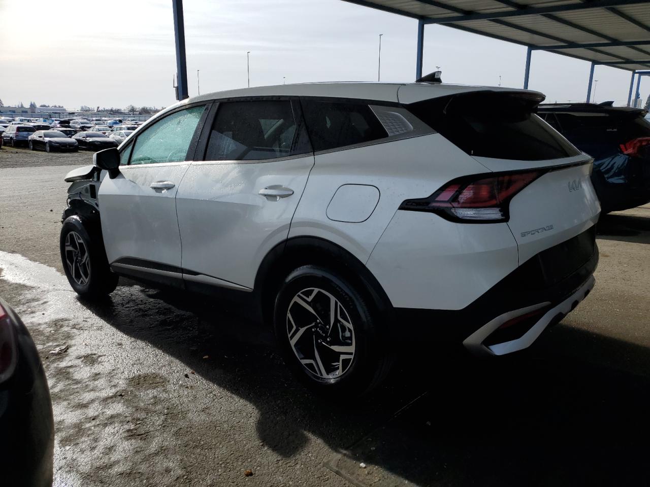 Изображение 2 2023 KIA SPORTAGE LX 2023 с VIN KNDPUCAF7P7166928