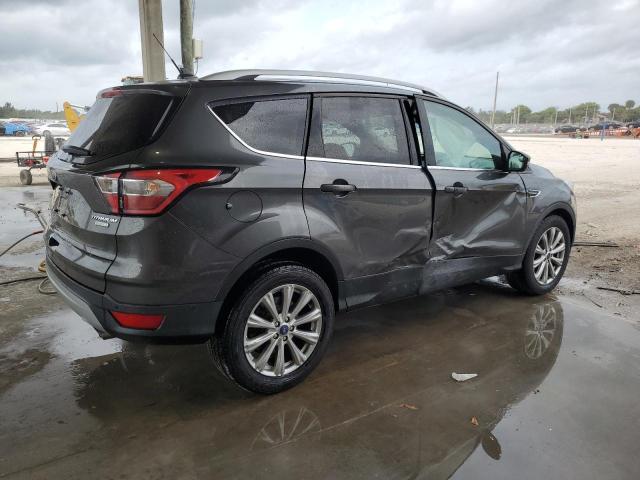 Изображение 3 2018 FORD ESCAPE TITANIUM 2018 с VIN 1FMCU0J9XJUD00617