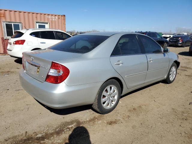 Obraz 3 z 2002 TOYOTA CAMRY LE 2002 z VIN 4T1BF30K72U525171