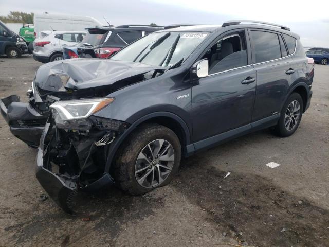 Image 1 of 2018 TOYOTA RAV4 HV LE 2018 with VIN JTMRJREV1JD243467