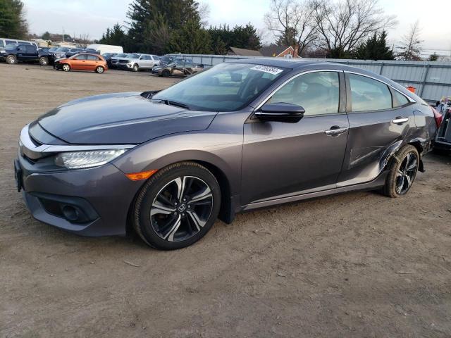 Image 1 of 2017 HONDA CIVIC TOURING 2017 with VIN 2HGFC1F97HH655262
