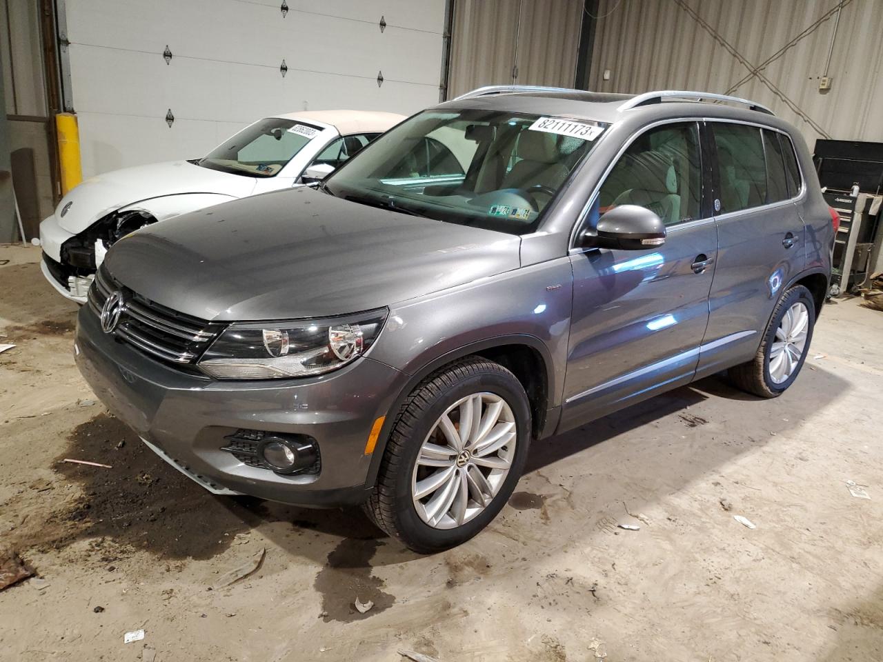 Image 1 of 2012 VOLKSWAGEN TIGUAN S 2012 with VIN WVGAV7AX0CW005903