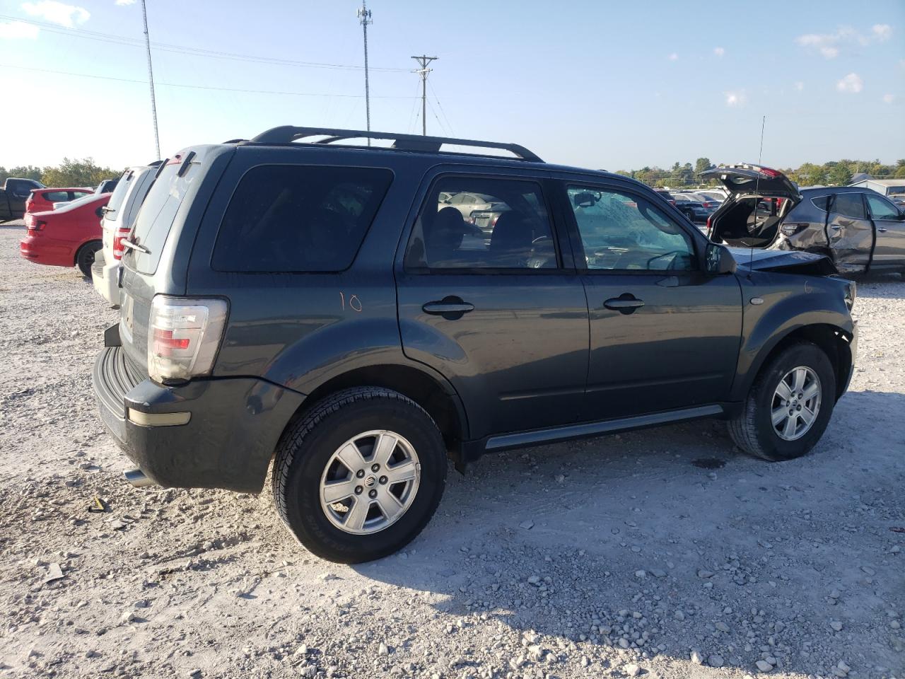 Изображение 3 Mercury Mariner 2009 с VIN 4M2CU81779KJ03097