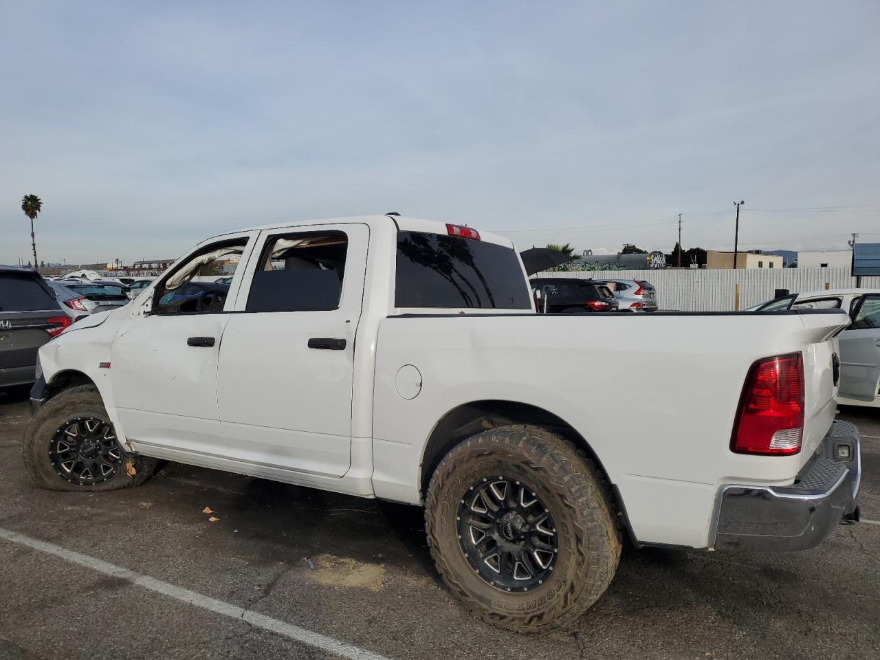 Image 2 of 2018 RAM 1500 ST 2018 with VIN 1C6RR6KM9JS225904