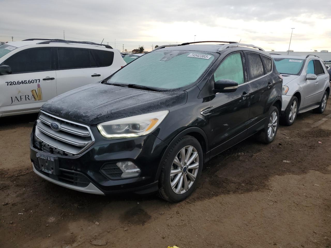 Изображение 1 2017 FORD ESCAPE TITANIUM 2017 с VIN 1FMCU9J90HUC38580