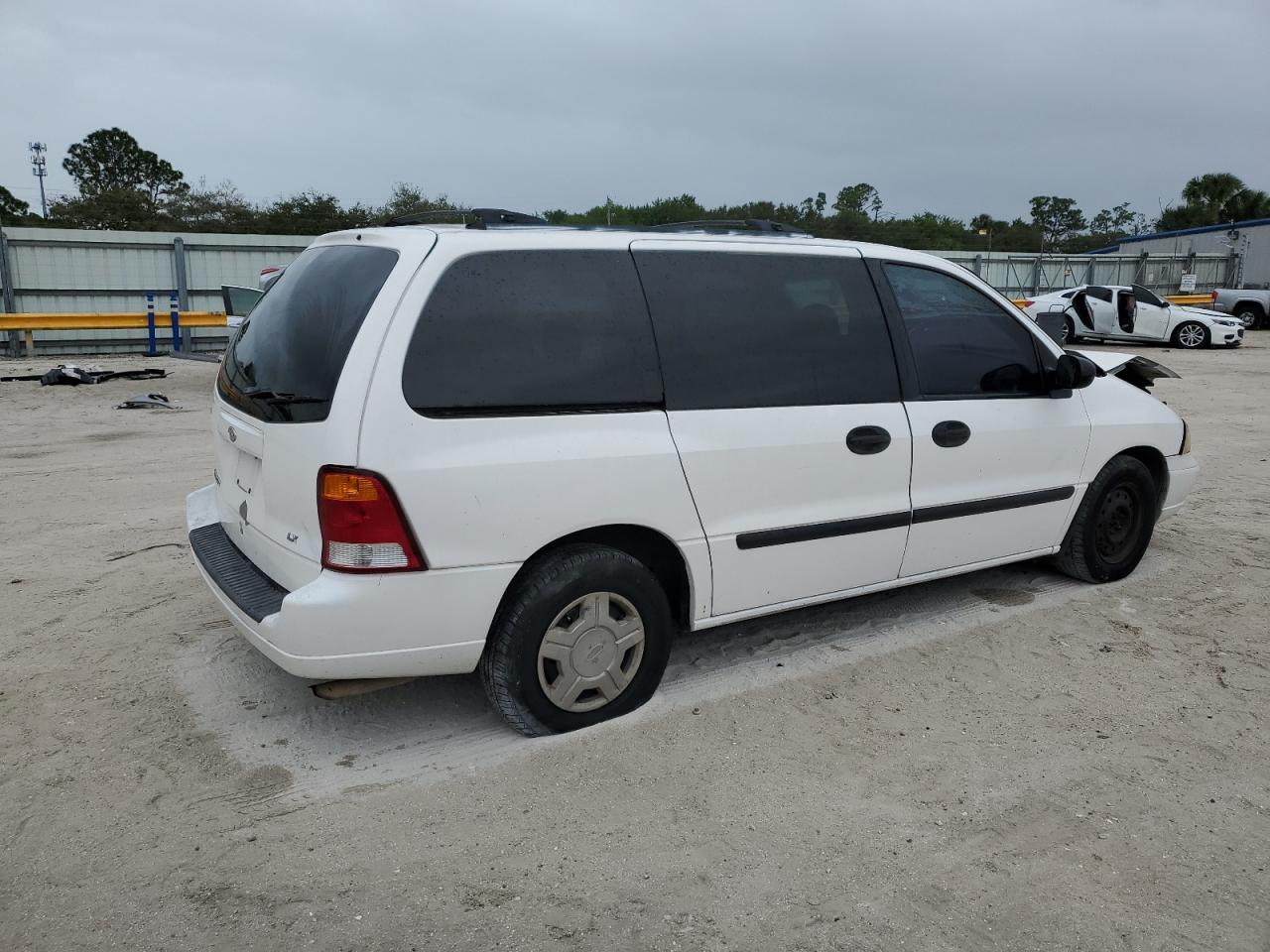 Obraz 3 z 2002 FORD WINDSTAR LX 2002 z VIN 2FMZA51442BA71461