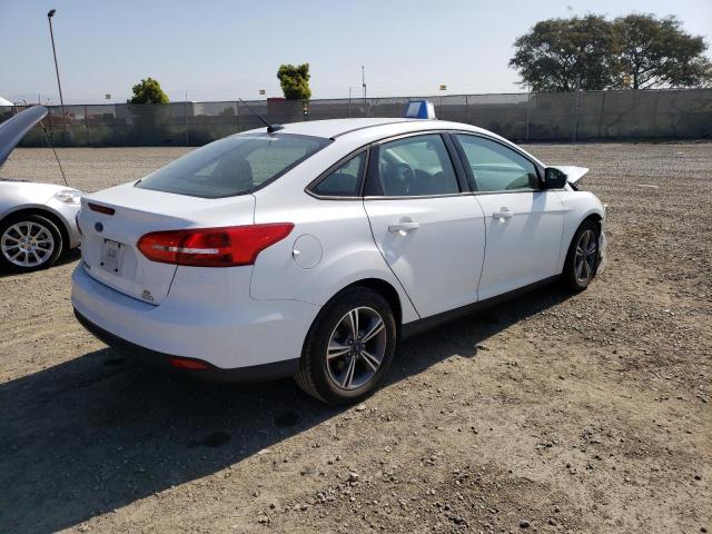Изображение 3 2018 FORD FOCUS SE 2018 с VIN 1FADP3FE8JL205136