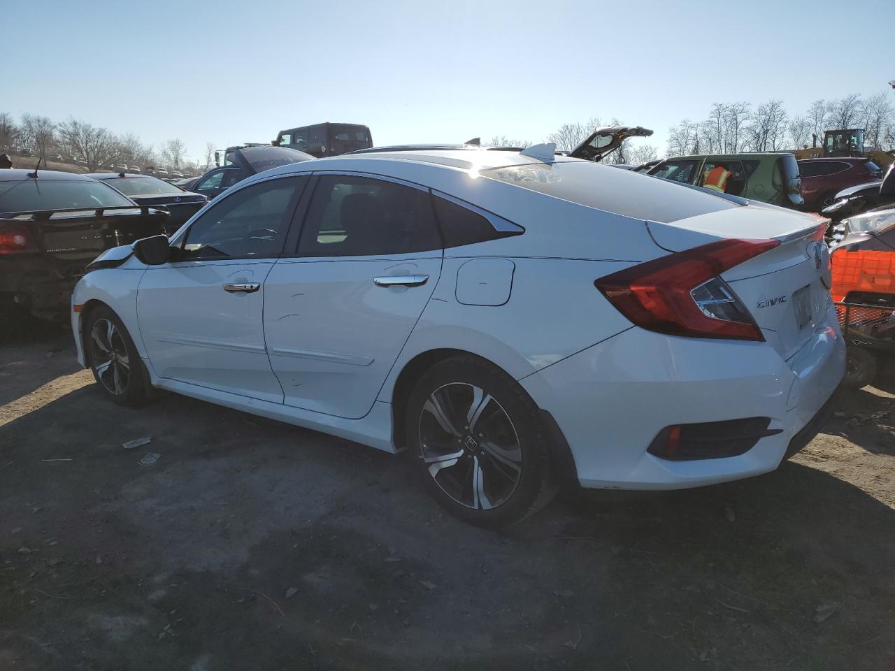 Obraz 2 z 2016 HONDA CIVIC TOURING 2016 z VIN 2HGFC1F99GH635657