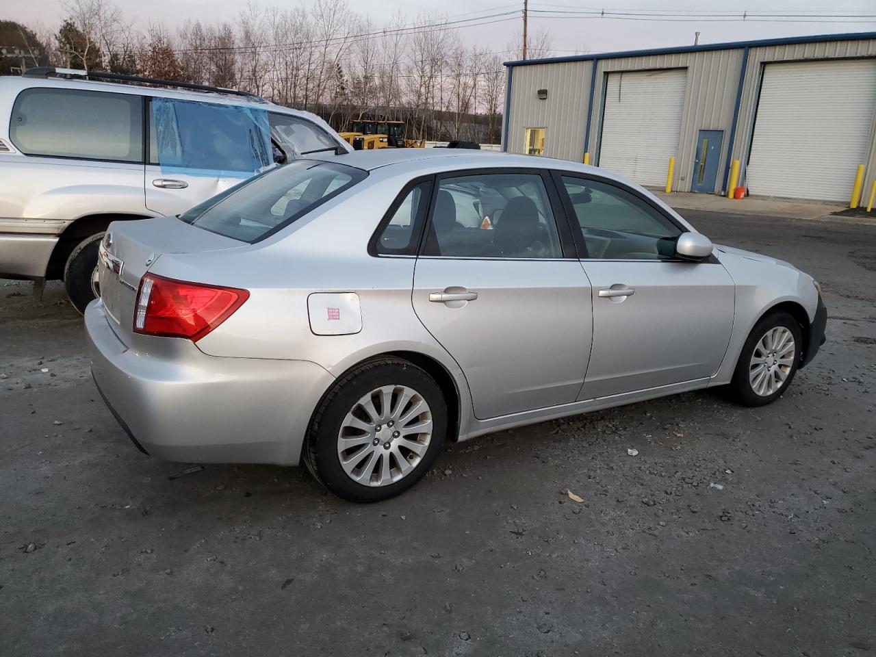 Image 3 of 2010 SUBARU IMPREZA 2.5I PREMIUM 2010 with VIN JF1GE6B69AH510232