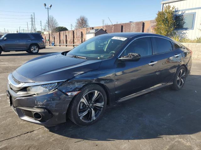 Obraz 1 z 2016 HONDA CIVIC TOURING 2016 z VIN 19XFC1F98GE219724