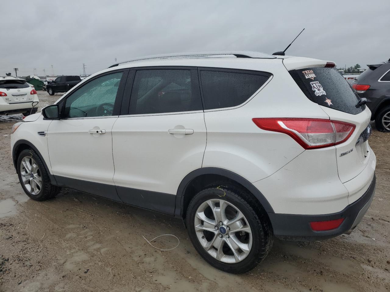 Obraz 2 z 2016 FORD ESCAPE TITANIUM 2016 z VIN 1FMCU0J94GUA28963