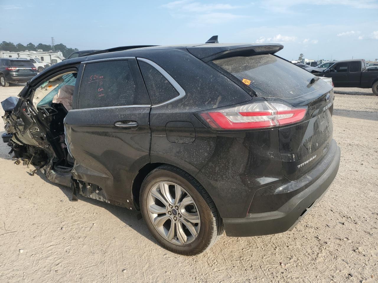 Изображение 2 Ford Edge Titanium 2022 с VIN 2FMPK4K93NBA37623
