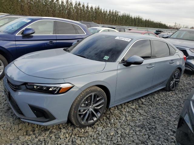 Изображение 1 2024 HONDA CIVIC TOURING 2024 с VIN 2HGFE1F93RH307504