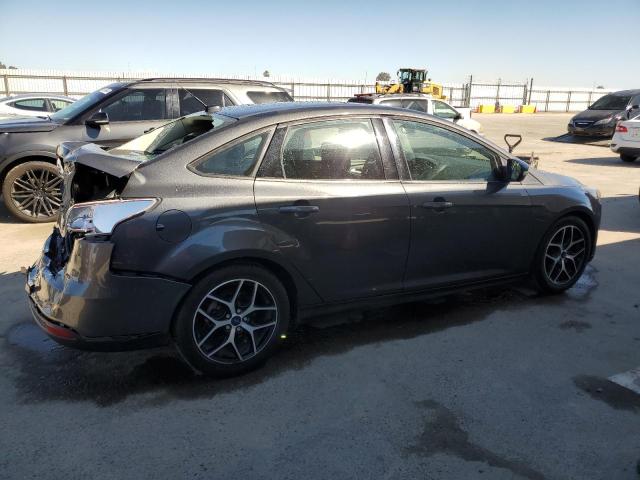 Obraz 3 z 2017 FORD FOCUS SEL 2017 z VIN 1FADP3H22HL214881