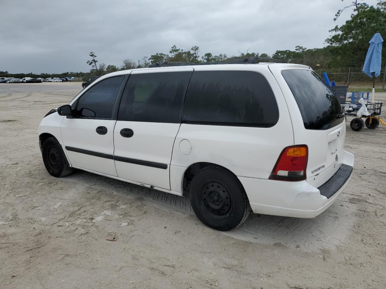 Obraz 2 z 2002 FORD WINDSTAR LX 2002 z VIN 2FMZA51442BA71461