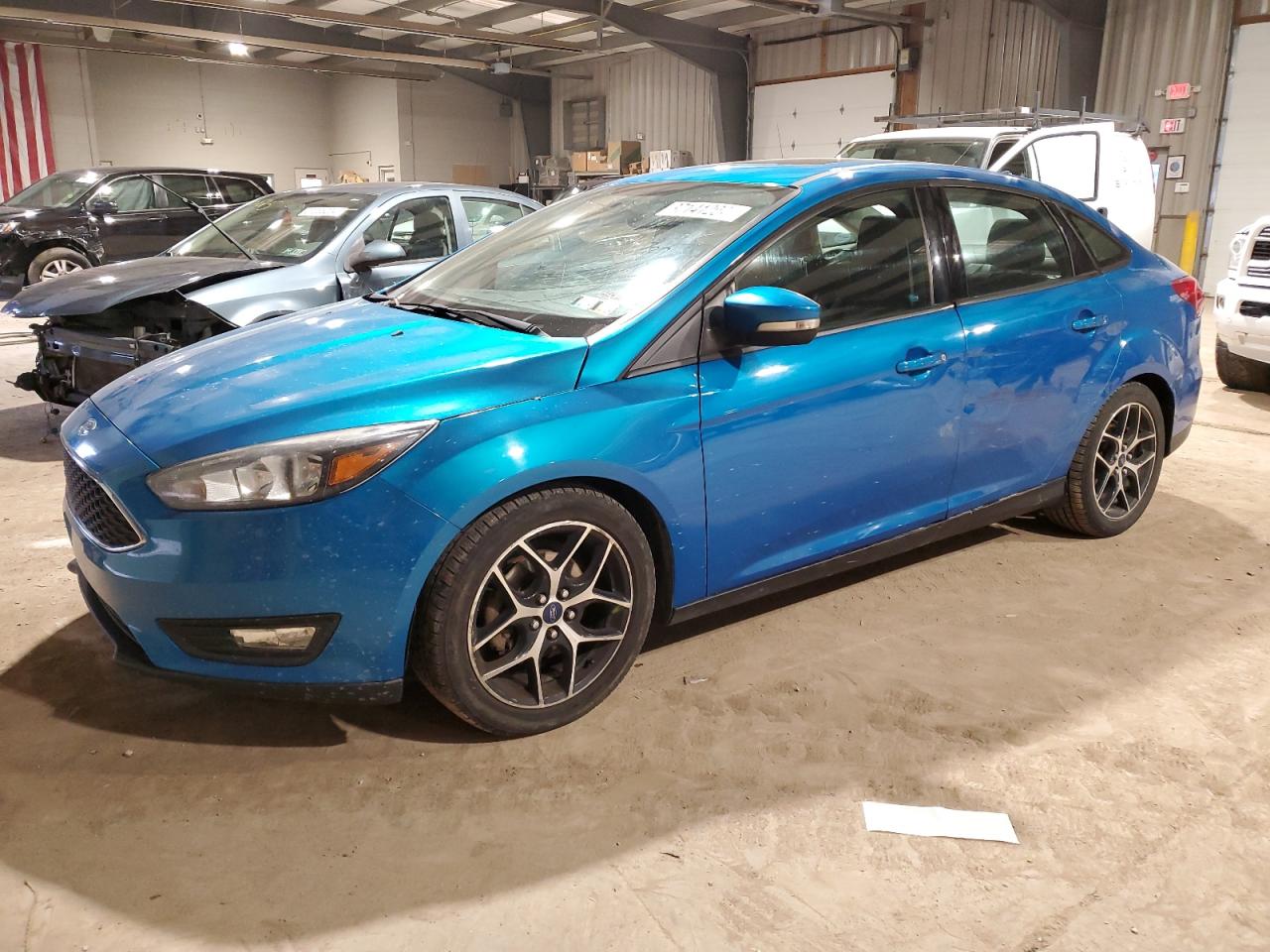 Image 1 of 2017 FORD FOCUS SEL 2017 with VIN 1FADP3H24HL203333