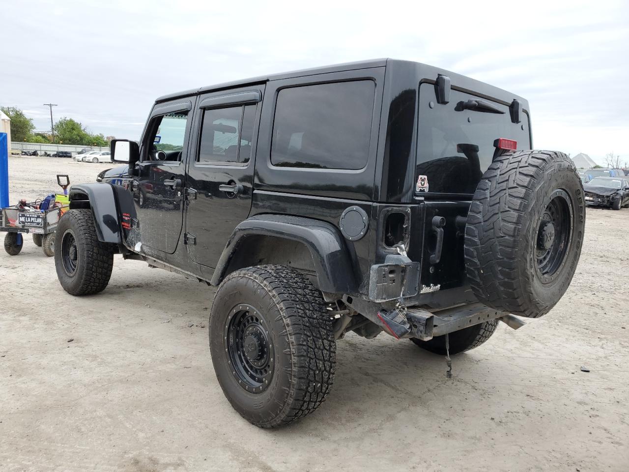 Obraz 2 z 2012 JEEP WRANGLER UNLIMITED SAHARA 2012 z VIN 1C4HJWEG0CL104743