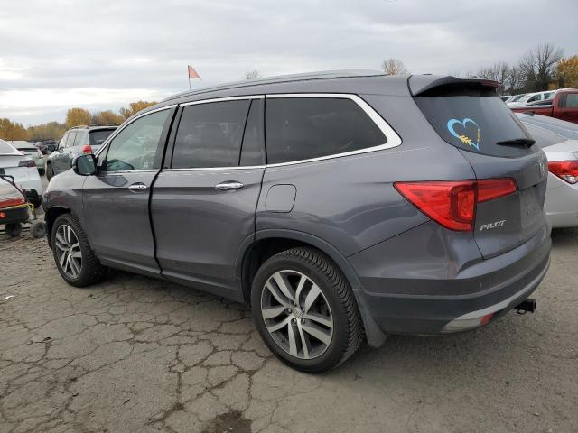 Obraz 2 z 2018 HONDA PILOT TOURING 2018 z VIN 5FNYF6H92JB051316