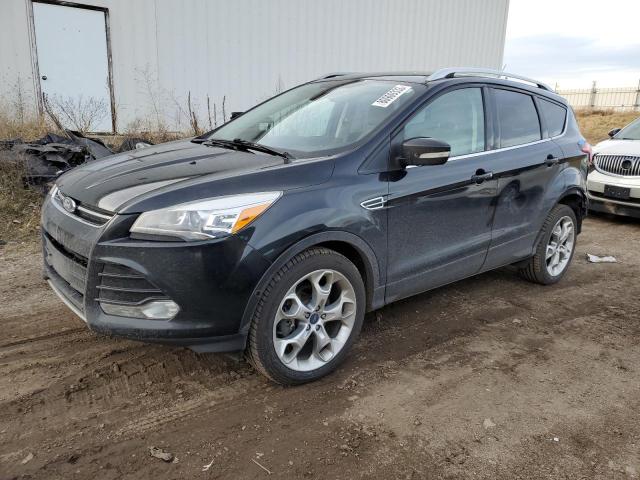 Image 1 of 2014 FORD ESCAPE TITANIUM 2014 with VIN 1FMCU0J98EUE57925