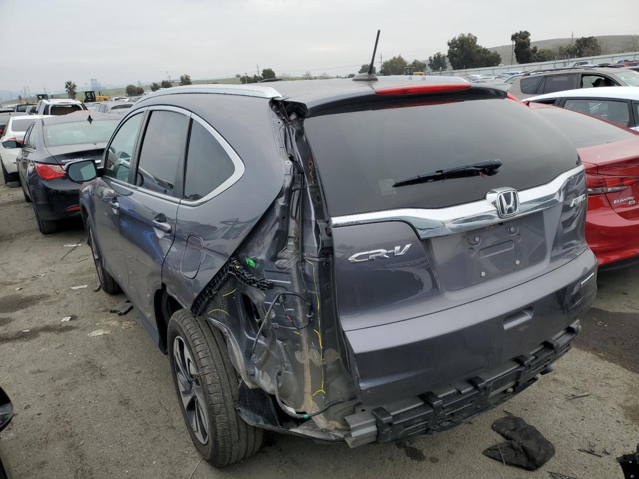 Image 2 of 2015 HONDA CR-V TOURING 2015 with VIN 5J6RM4H97FL085037