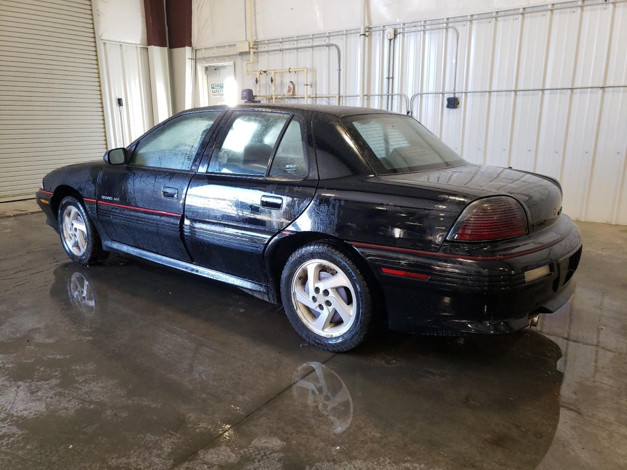 Image 2 of 1993 PONTIAC GRAND AM GT 1993 with VIN 1G2NW54A5PC734912