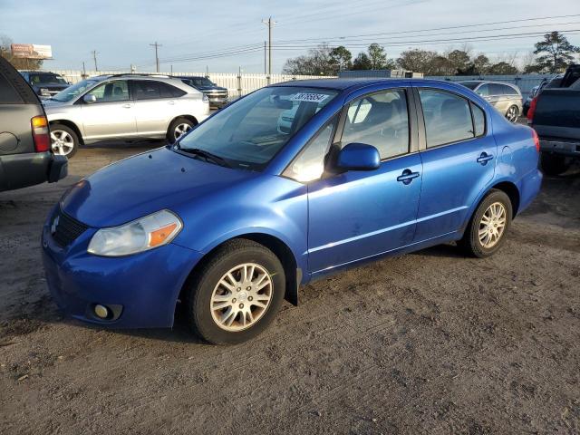 Изображение 1 2012 SUZUKI SX4 LE 2012 с VIN JS2YC5A3XC6303133