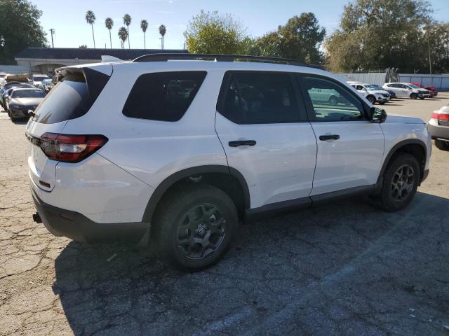 Изображение 3 2023 HONDA PILOT TRAILSPORT 2023 с VIN 5FNYG1H64PB048383