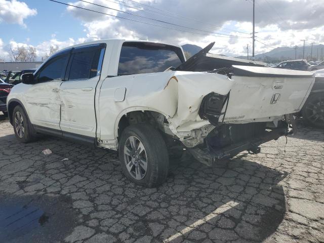 Изображение 2 2017 HONDA RIDGELINE 2017 с VIN 5FPYKSF65GB018380