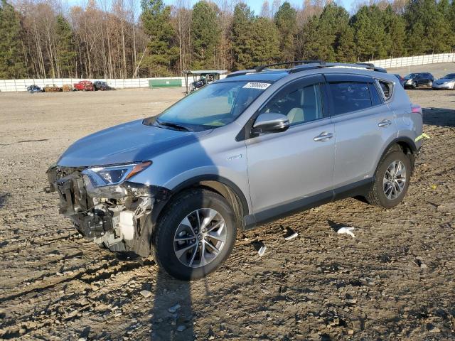 Изображение 1 2018 TOYOTA RAV4 HV LE 2018 с VIN JTMRJREV6JD187199
