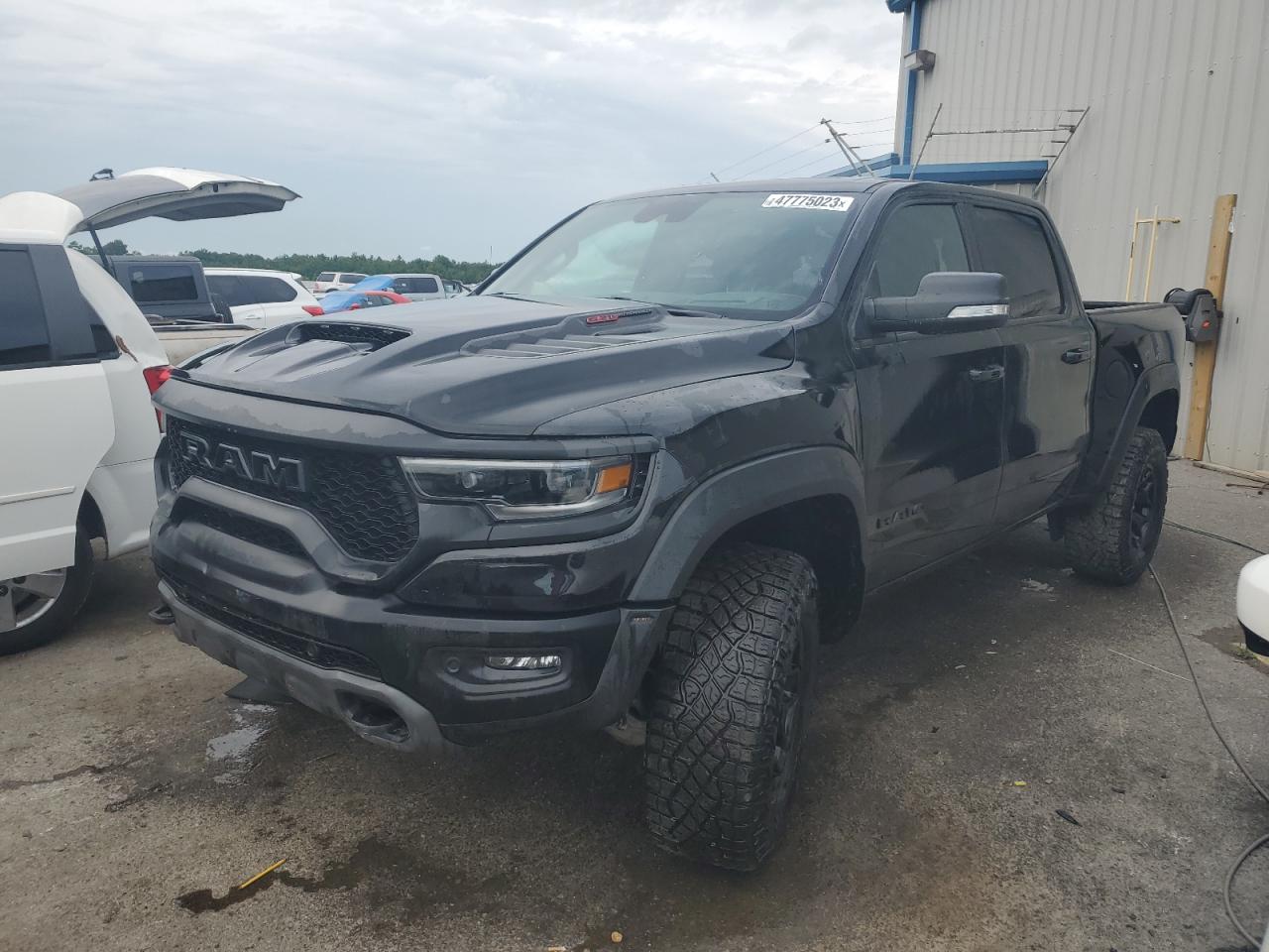 Image 1 of 2022 RAM 1500 TRX 2022 with VIN 1C6SRFU99NN144867