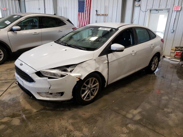 Obraz 1 z 2016 FORD FOCUS SE 2016 z VIN 1FADP3F21GL294739
