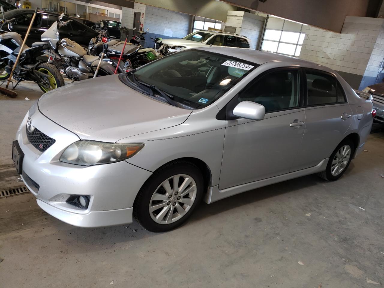 Obraz 1 z 2009 TOYOTA COROLLA BASE 2009 z VIN 1NXBU40E19Z081575