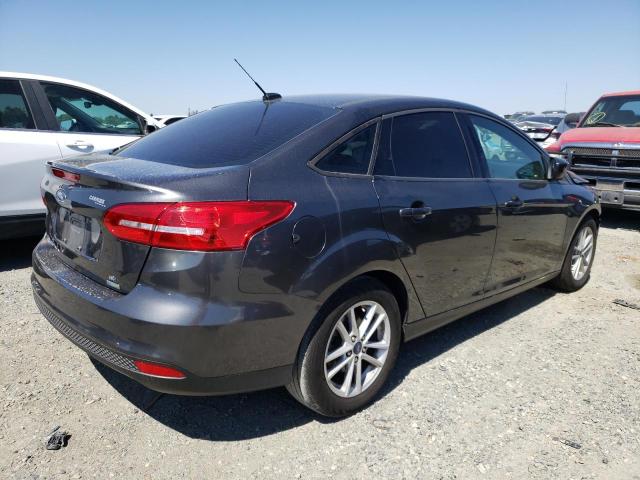 Image 3 of 2018 FORD FOCUS SE 2018 with VIN 1FADP3FE6JL304568