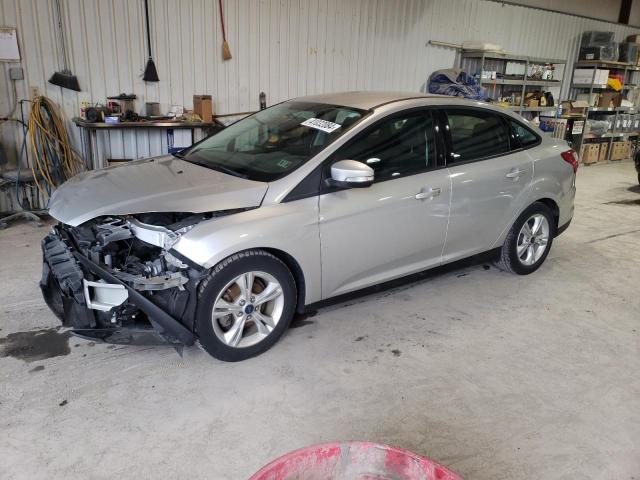 Image 1 of 2014 FORD FOCUS SE 2014 with VIN 1FADP3F21EL353219