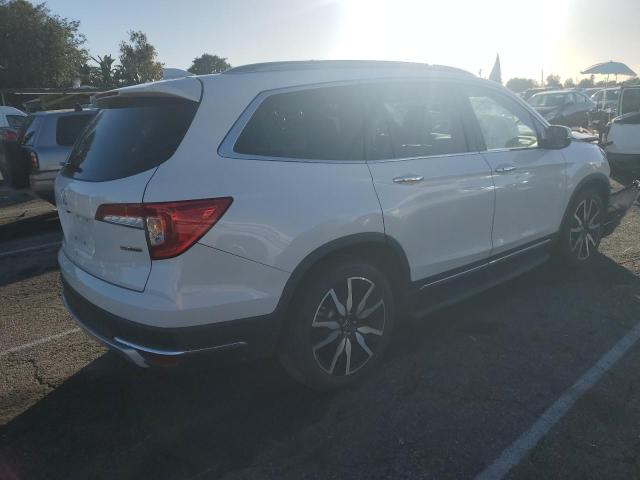 Obraz 3 z 2021 HONDA PILOT TOURING 2021 z VIN 5FNYF5H93MB021000