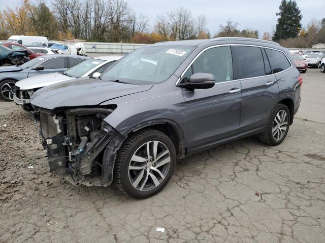 Obraz 1 z 2018 HONDA PILOT TOURING 2018 z VIN 5FNYF6H92JB051316