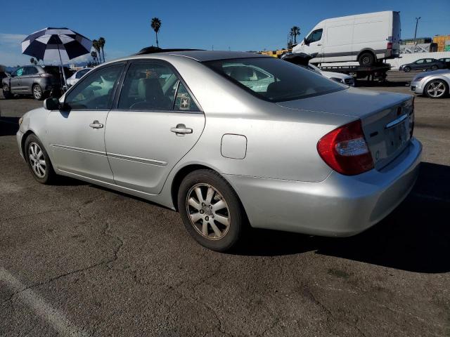 Obraz 2 z 2002 TOYOTA CAMRY LE 2002 z VIN 4T1BF30K52U002182