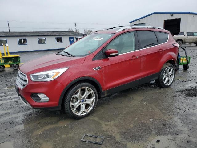 Image 1 of 2017 FORD ESCAPE TITANIUM 2017 with VIN 1FMCU9J95HUC81036