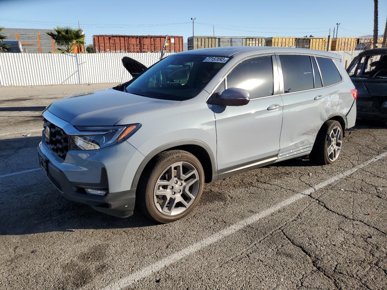 Image 1 of 2022 HONDA PASSPORT EXL 2022 with VIN 5FNYF7H57NB001553