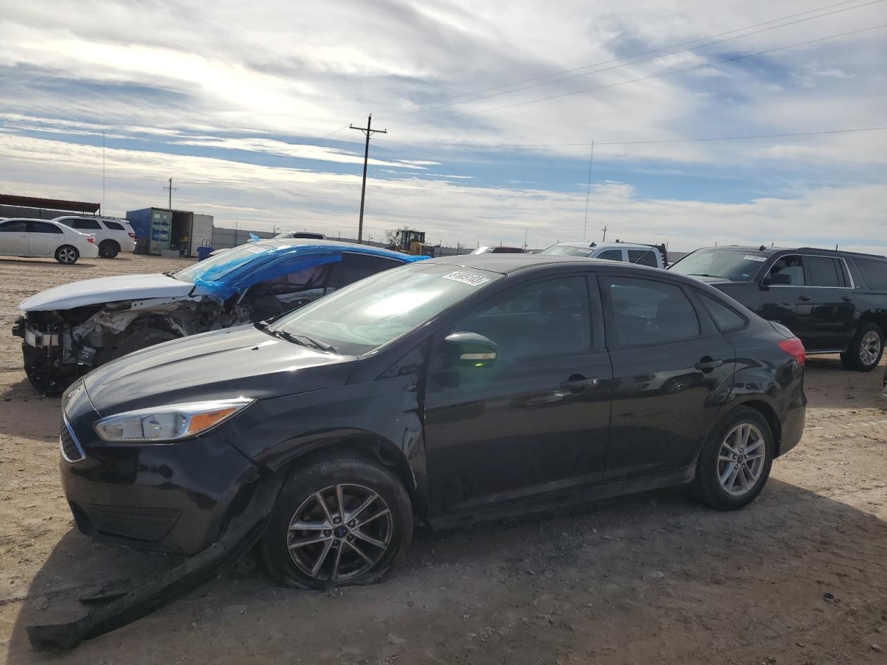 Image 1 of 2015 FORD FOCUS SE 2015 with VIN 1FADP3F24FL230435